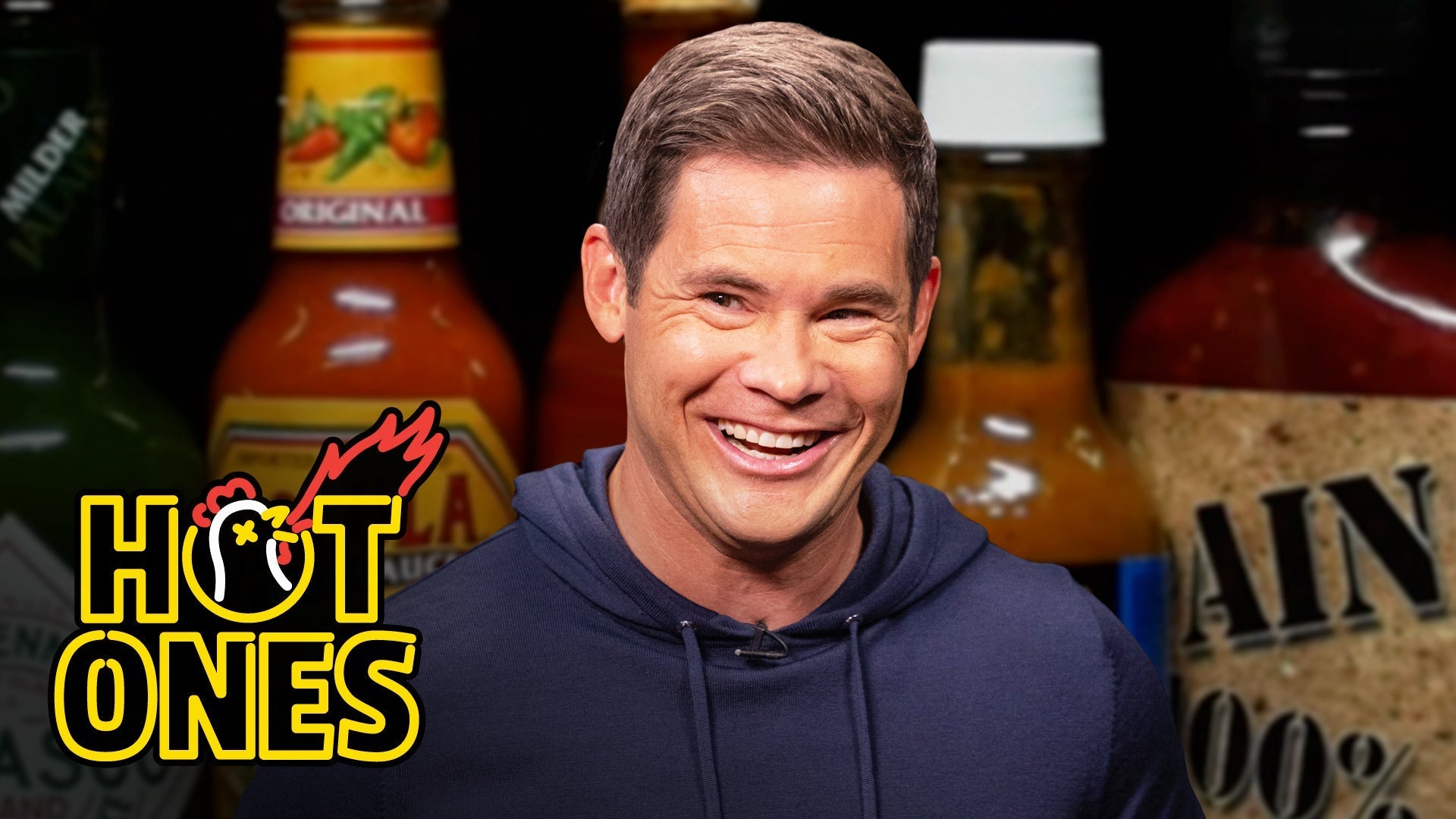 Adam Devine Shocks a Live Audience While Eating Spicy Wings