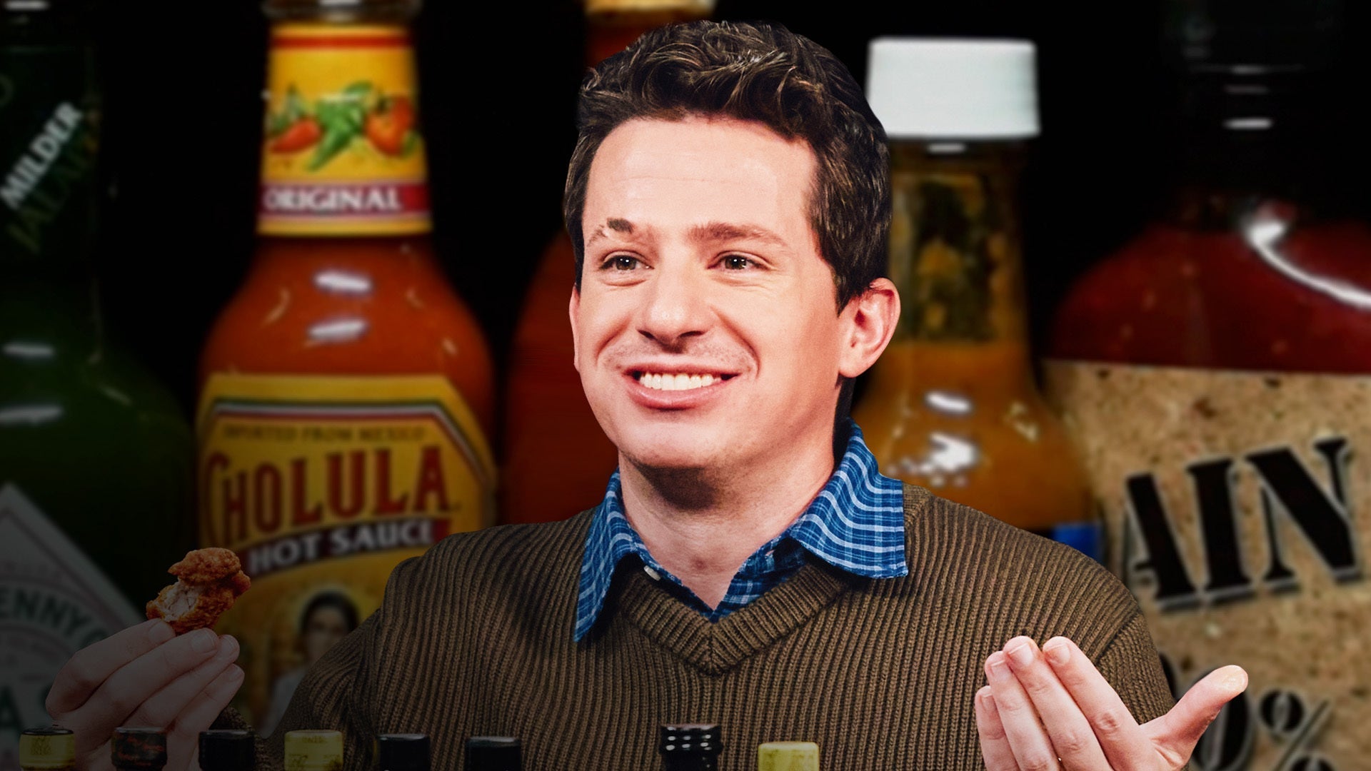 Charlie Puth Beats Himself Up While Eating Spicy Wings