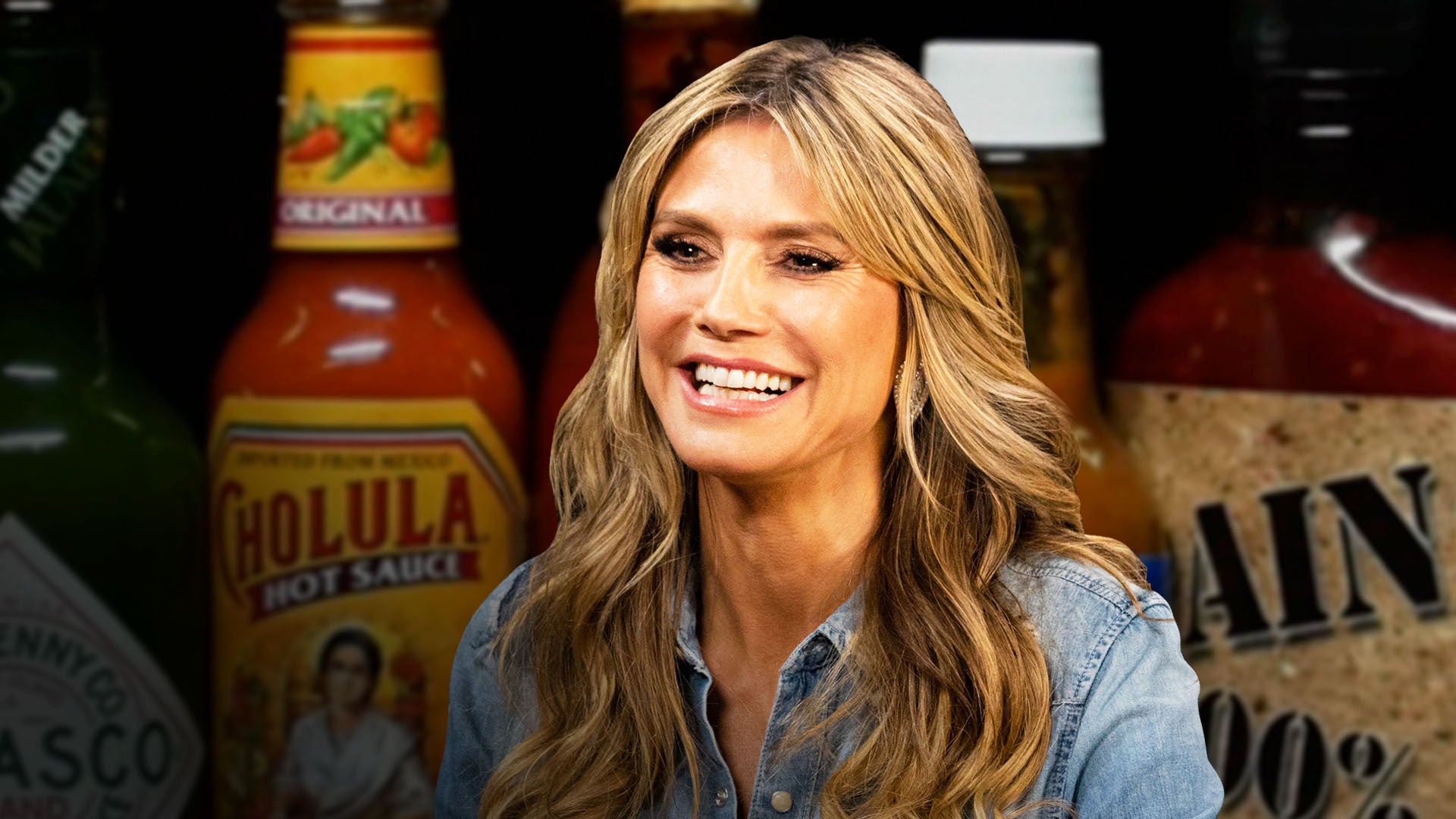 Heidi Klum Strikes a Pose While Eating Spicy Wings
